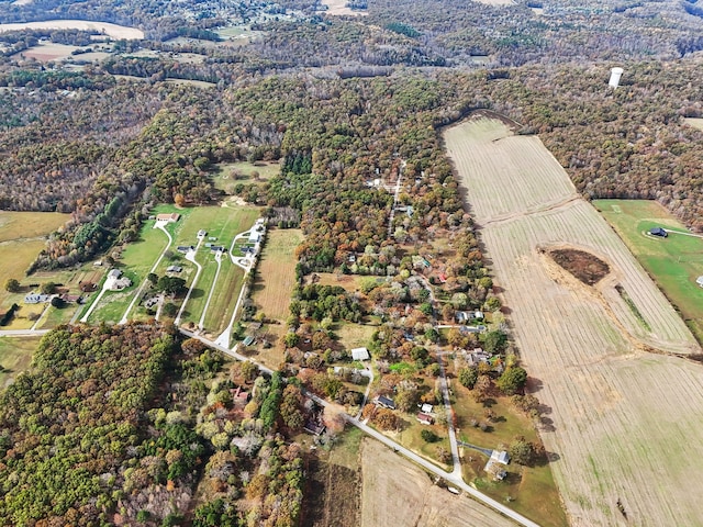 birds eye view of property featuring a rural view