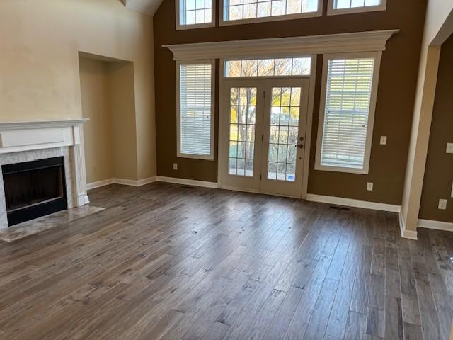 doorway to outside featuring dark wood-type flooring