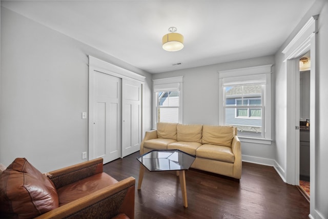 living room with dark wood-type flooring