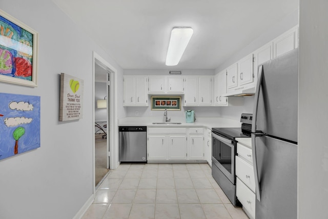 kitchen featuring stainless steel appliances, a sink, under cabinet range hood, light countertops, and white cabinetry