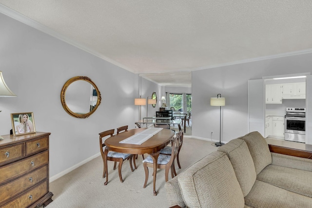 dining space featuring crown molding, light colored carpet, baseboards, and a textured ceiling