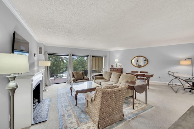 living room featuring a textured ceiling, ornamental molding, carpet flooring, and a fireplace