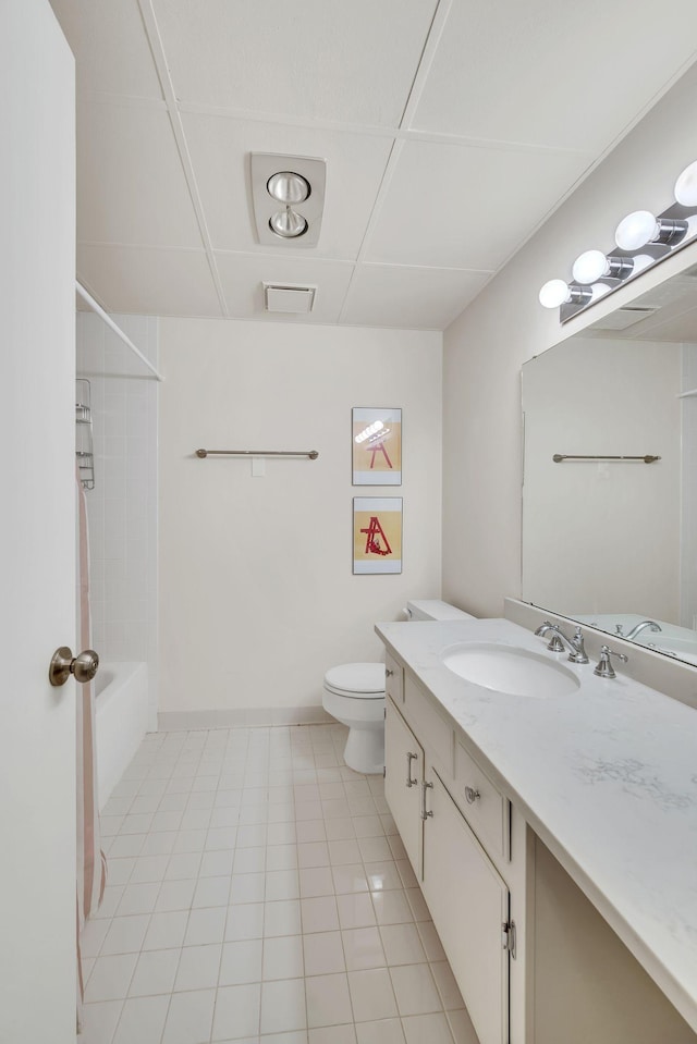 bathroom with vanity, toilet, and shower / bath combination