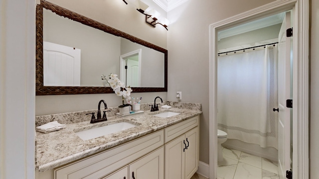 full bathroom featuring vanity, toilet, and shower / tub combo