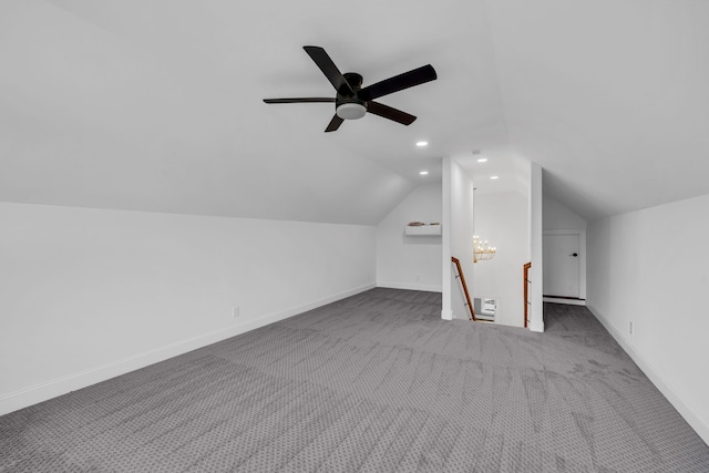 bonus room with lofted ceiling, carpet floors, and ceiling fan