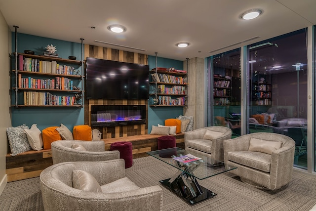 living area with carpet flooring