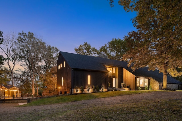 view of front of house with a yard