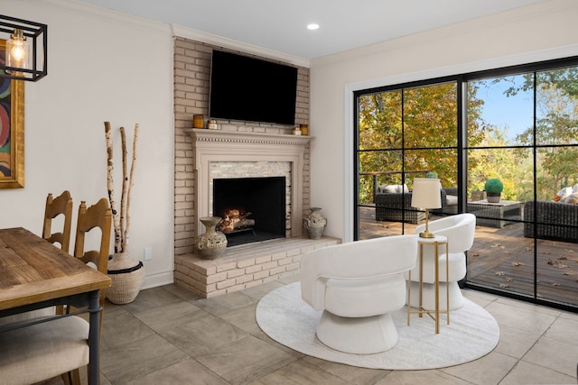 tiled living room featuring ornamental molding and a fireplace