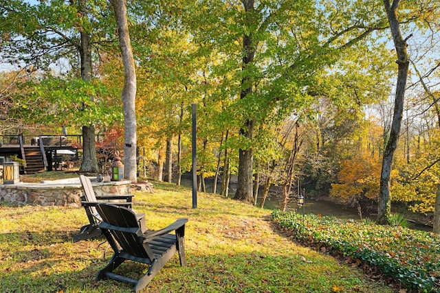 surrounding community featuring a deck