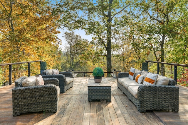 wooden terrace with outdoor lounge area