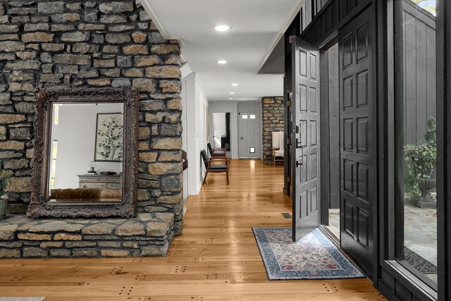 foyer entrance with light wood-type flooring