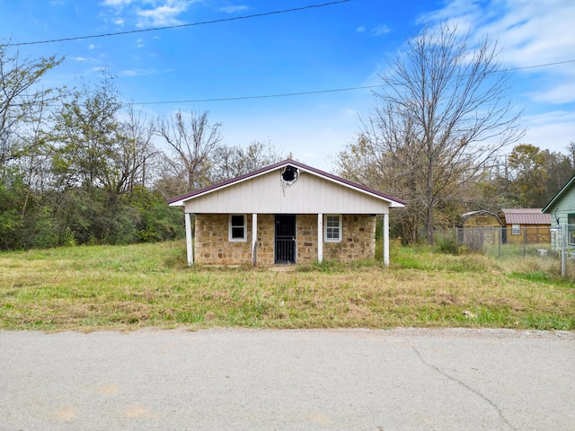 view of front of home with a carport