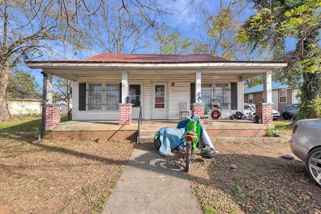 view of front of home featuring covered porch