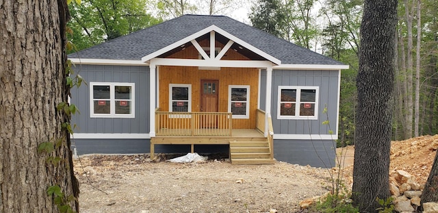 view of outbuilding with a porch