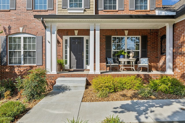 doorway to property with covered porch