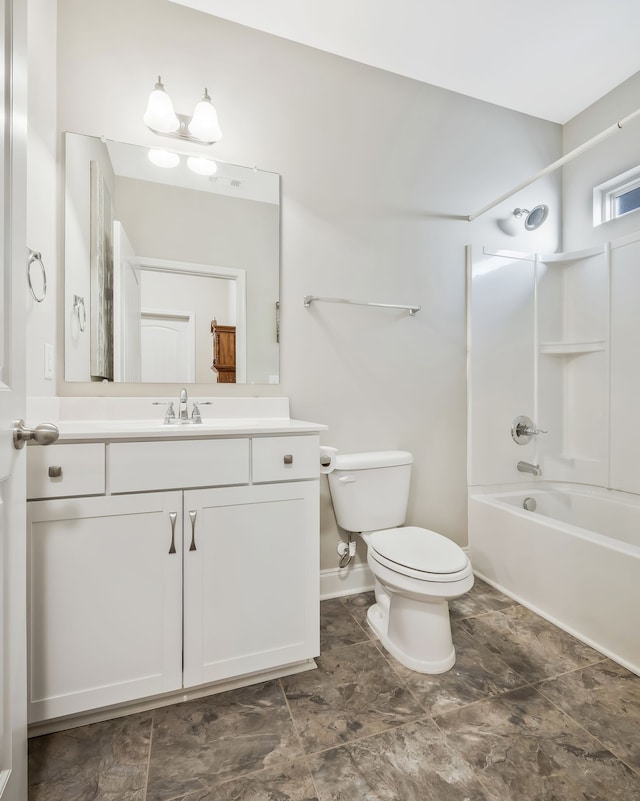 full bathroom featuring toilet, bathtub / shower combination, and vanity