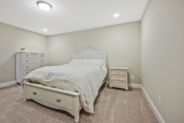 bedroom with light carpet