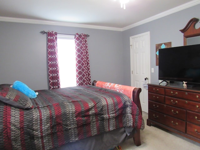 bedroom featuring crown molding and light colored carpet