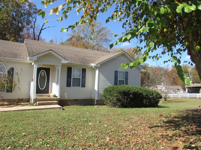 single story home featuring a front yard