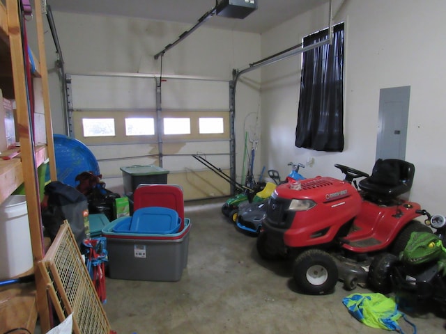 garage featuring a garage door opener and electric panel