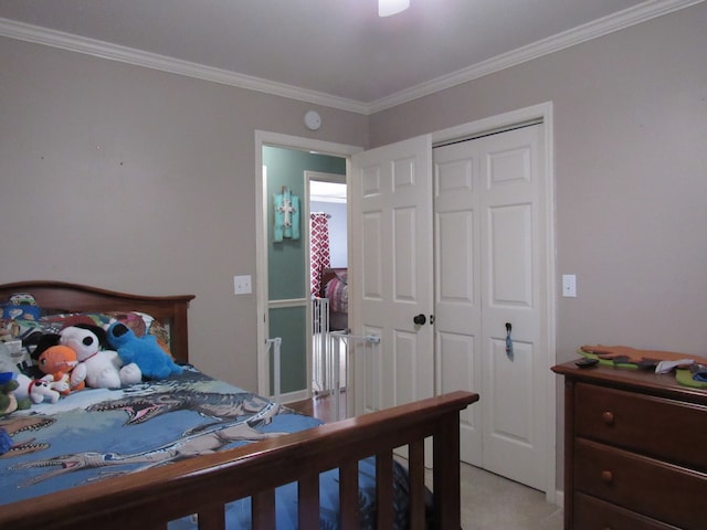 bedroom with light carpet, a closet, and ornamental molding