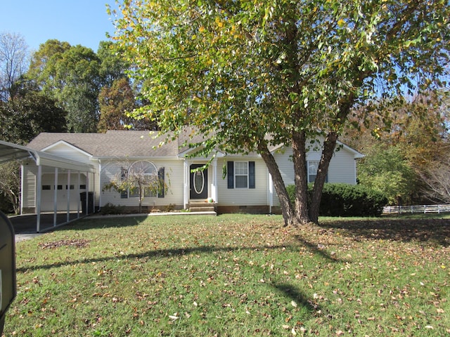 view of front of house with a front lawn and a garage