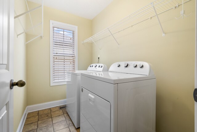 laundry area with washing machine and dryer