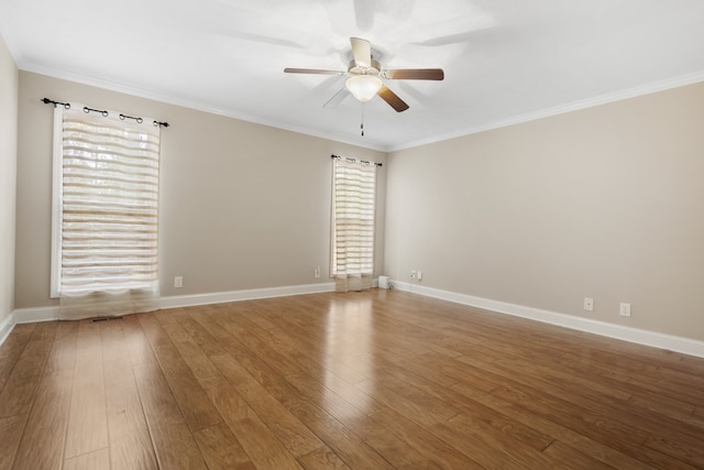 spare room featuring ceiling fan, hardwood / wood-style flooring, and ornamental molding