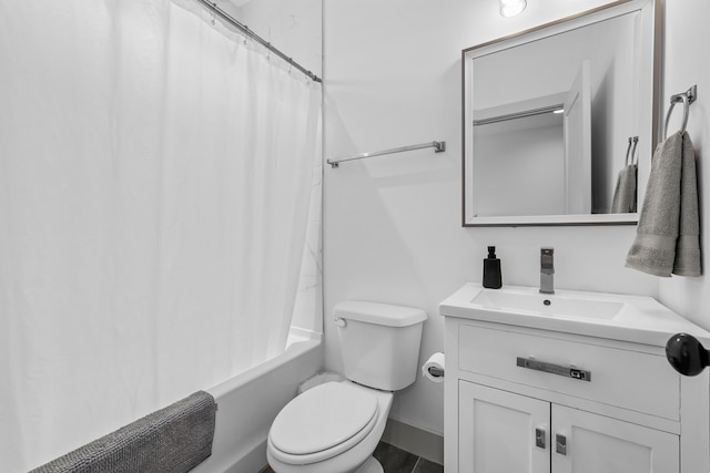 full bathroom with vanity, toilet, and shower / tub combo