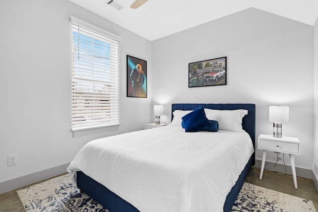 bedroom with lofted ceiling and ceiling fan