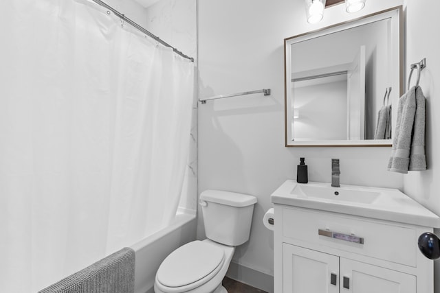 full bathroom with vanity, shower / bath combo, and toilet