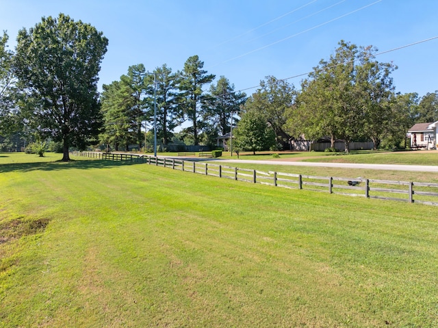 view of yard with a rural view