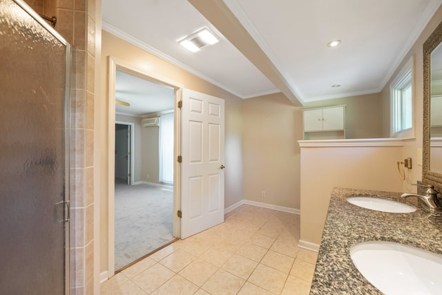 bathroom featuring vanity, an enclosed shower, tile patterned floors, and crown molding