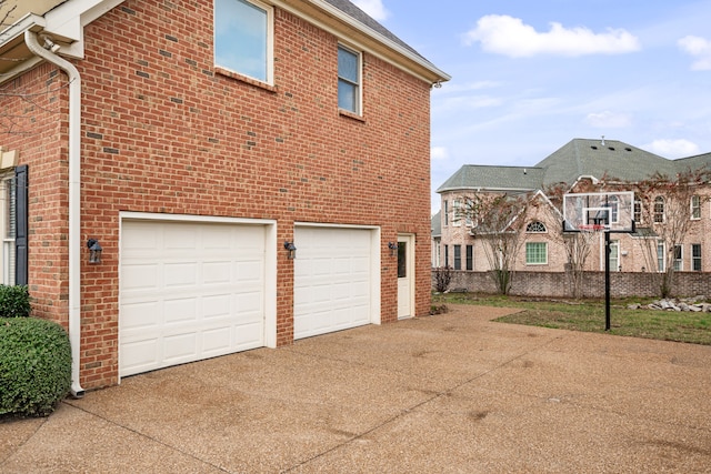 view of property exterior featuring a garage