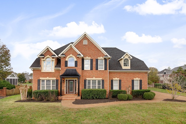 view of front facade with a front lawn