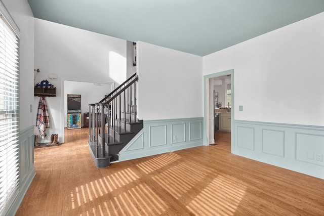 interior space with hardwood / wood-style flooring and plenty of natural light