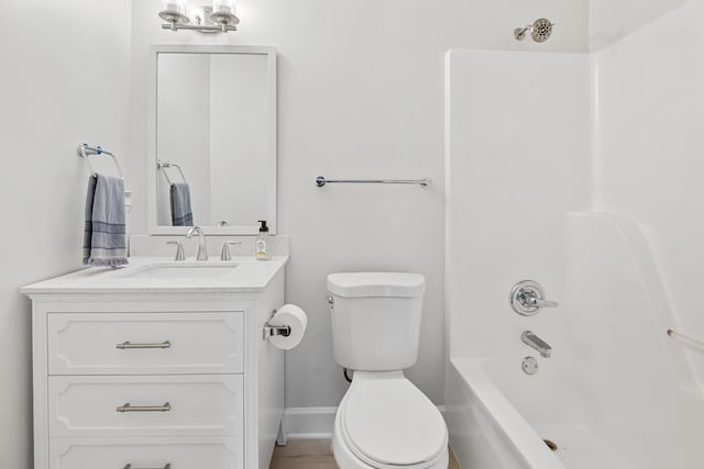 full bathroom with toilet, washtub / shower combination, and vanity