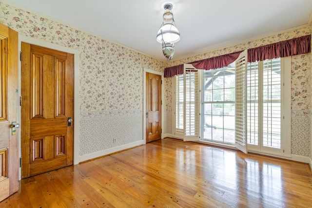 spare room featuring hardwood / wood-style floors