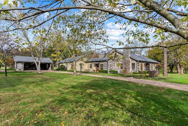 single story home with a front yard