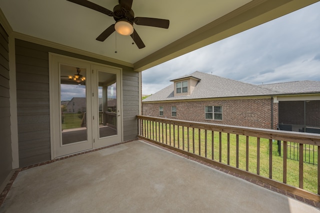 balcony with french doors, ceiling fan, and a patio area