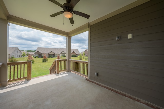 view of patio featuring ceiling fan