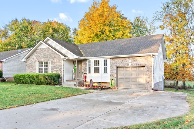 ranch-style house featuring a garage and a front lawn