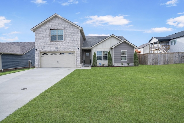 front of property featuring a garage and a front yard