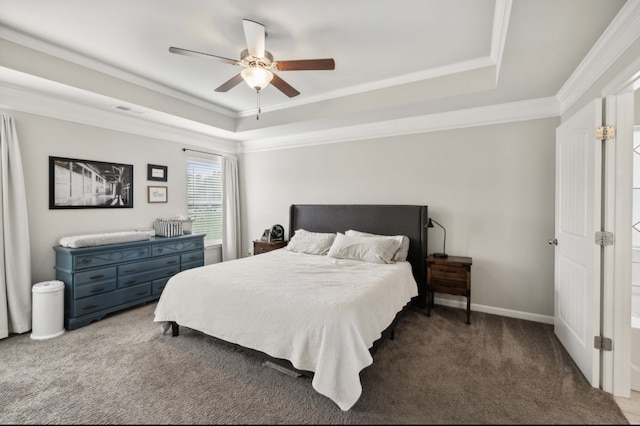 bedroom featuring crown molding, light colored carpet, a raised ceiling, and ceiling fan