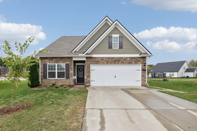 craftsman inspired home with a front lawn and a garage