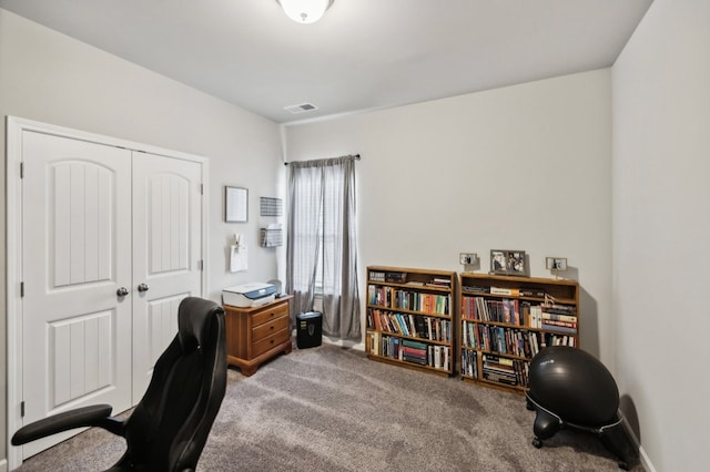 office area featuring light colored carpet