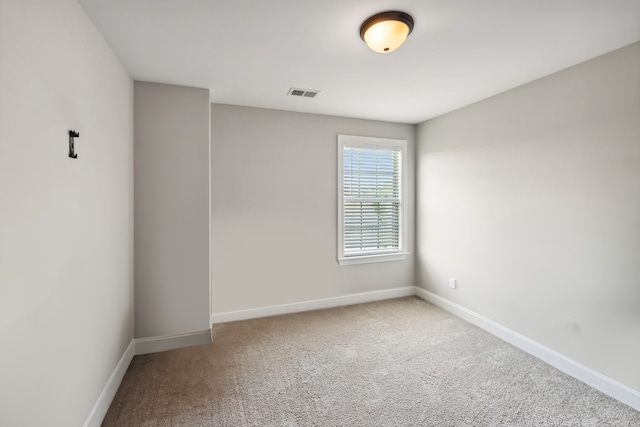 empty room featuring carpet flooring