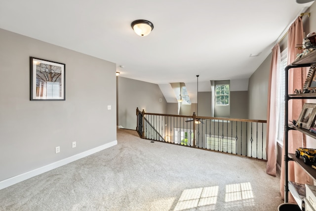 spare room featuring carpet floors