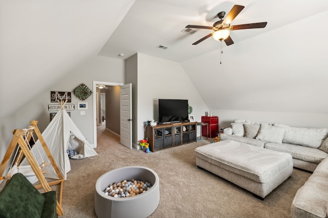 carpeted living room featuring ceiling fan and lofted ceiling