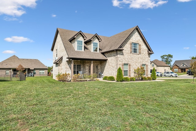 view of front of home with a front lawn